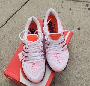 Nike White and Orange Athletic Shoes with Modern Design